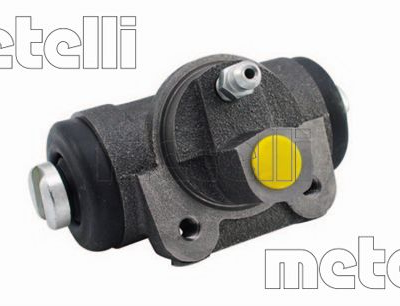 Car brake master cylinder with mounting tabs and hydraulic ports, viewed from the side