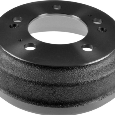 Black automotive brake drum with a central bore and multiple mounting holes on a textured surface, used to house brake components