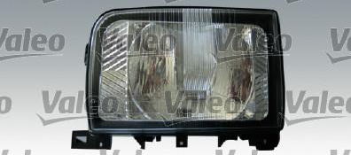 Rectangular automotive headlight assembly with clear lens and black housing, including mounting tabs and brackets.